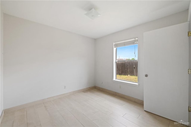 2216 Fairmont Ave, Mcallen, TX 78504 - unfurnished room featuring baseboards