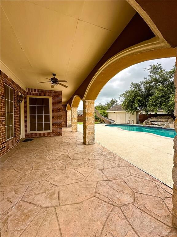 view of patio featuring ceiling fan