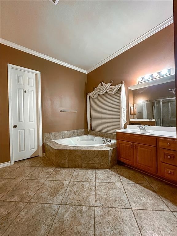 bathroom with crown molding, tile patterned flooring, vanity, and independent shower and bath