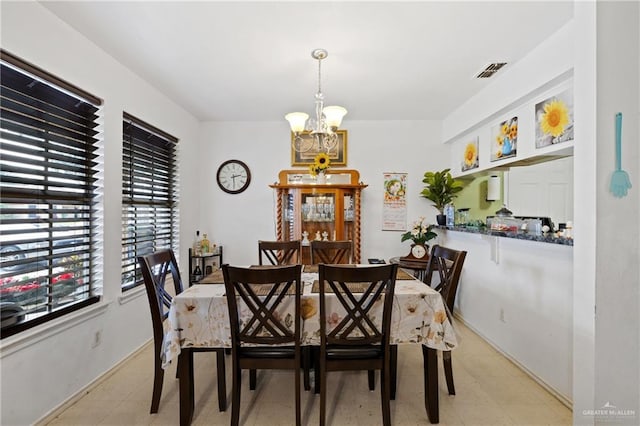 dining room featuring an inviting chandelier