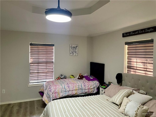 bedroom featuring dark hardwood / wood-style flooring