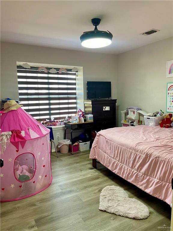 bedroom featuring light hardwood / wood-style floors