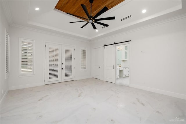 1313 Oriole Ave, Mcallen, TX 78504 - unfurnished bedroom with recessed lighting, a barn door, a raised ceiling, visible vents, and access to outside