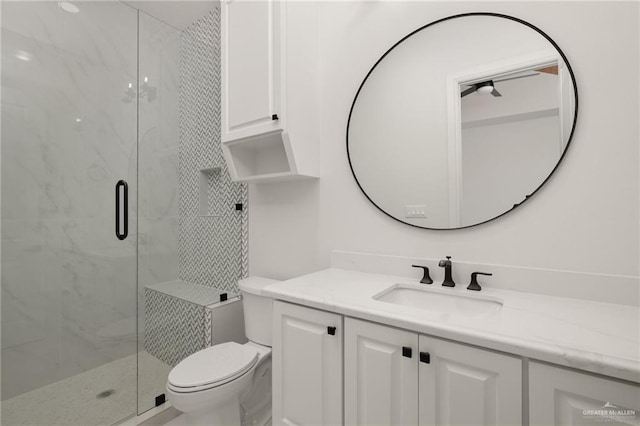 1313 Oriole Ave, Mcallen, TX 78504 - full bathroom featuring a stall shower, vanity, and toilet