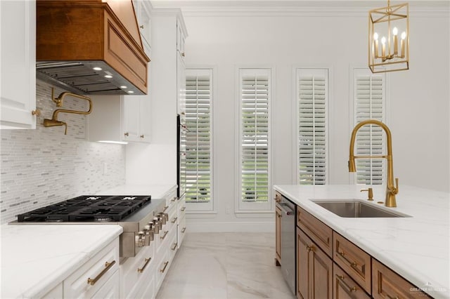 1313 Oriole Ave, Mcallen, TX 78504 - kitchen featuring marble finish floor, stainless steel appliances, an inviting chandelier, a sink, and custom exhaust hood
