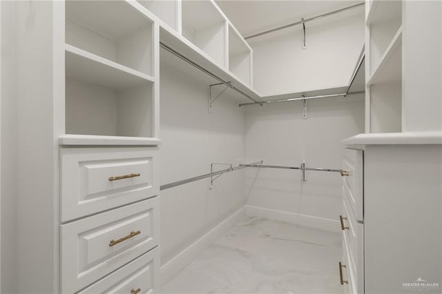 1313 Oriole Ave, Mcallen, TX 78504 - walk in closet featuring marble finish floor