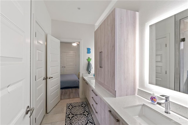2520 Colvin Ave, Edinburg, TX 78539 - bathroom featuring tile patterned flooring, vanity, and ceiling fan