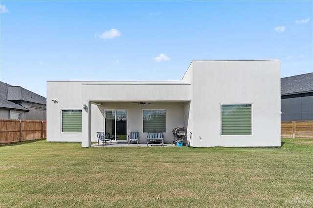 2520 Colvin Ave, Edinburg, TX 78539 - rear view of property with a lawn, ceiling fan, an outdoor living space, and a patio