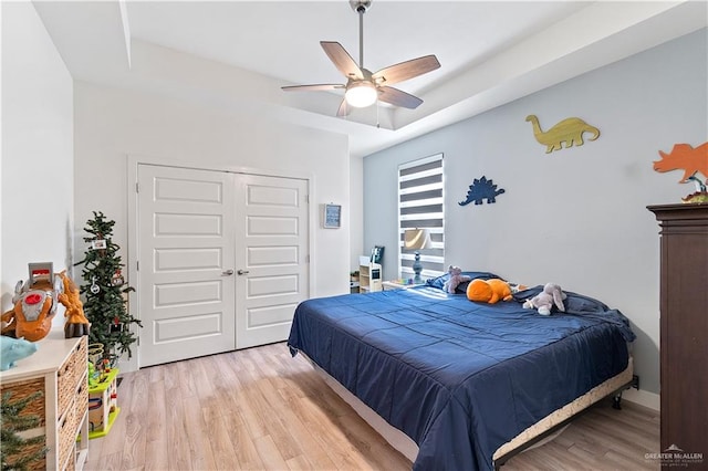 2520 Colvin Ave, Edinburg, TX 78539 - bedroom featuring ceiling fan, a closet, and light hardwood / wood-style floors