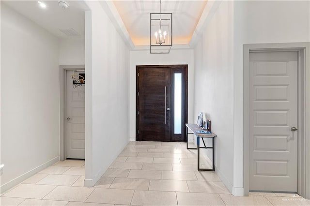 2520 Colvin Ave, Edinburg, TX 78539 - tiled entrance foyer featuring a chandelier