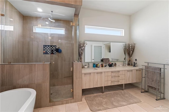 2520 Colvin Ave, Edinburg, TX 78539 - bathroom with tile patterned floors, vanity, and independent shower and bath