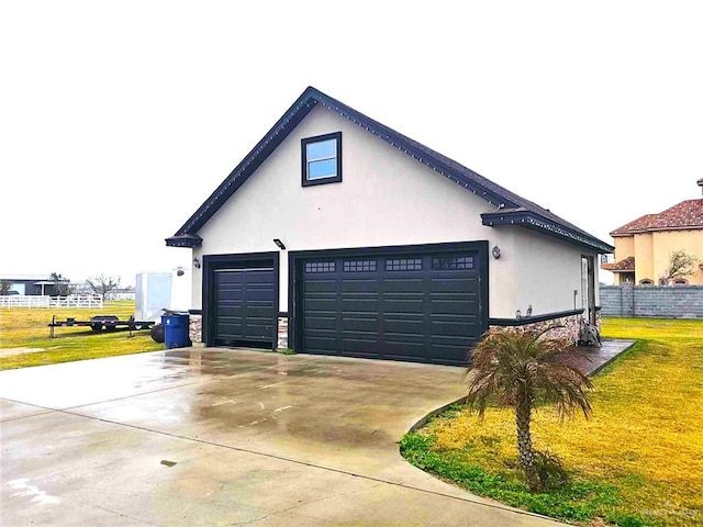 view of property exterior with a garage