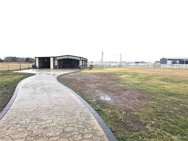 view of community featuring an outdoor structure