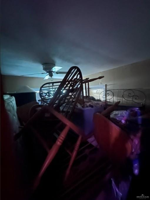 interior space featuring ceiling fan