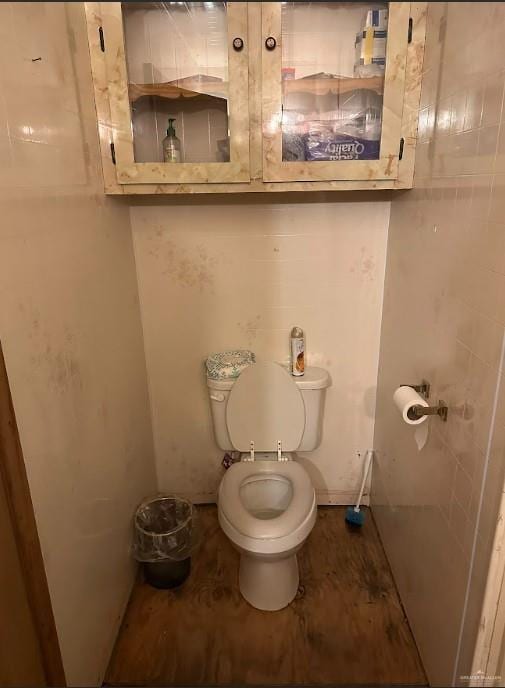 half bath featuring toilet