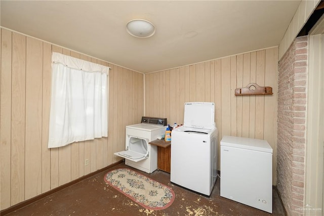 2805 N Blake St, Harlingen, TX 78550 - washroom with washer and dryer and wood walls