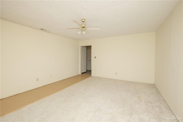 2805 N Blake St, Harlingen, TX 78550 - carpeted empty room featuring ceiling fan and a textured ceiling
