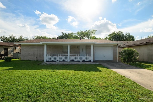 2805 N Blake St, Harlingen, TX 78550 - ranch-style house with a garage, brick siding, concrete driveway, a front lawn, and covered porch