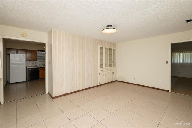 2805 N Blake St, Harlingen, TX 78550 - unfurnished room featuring a textured ceiling and light tile patterned floors