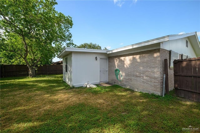 2805 N Blake St, Harlingen, TX 78550 - rear view of property with brick siding