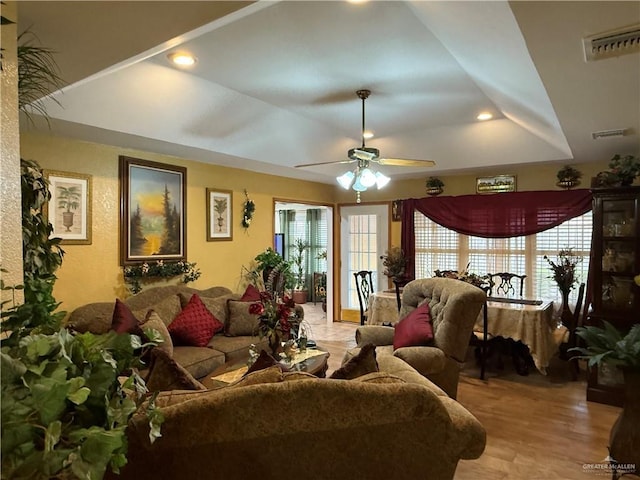 2312 Yarrow St, Mission, TX 78574 - living room featuring healthy amount of natural light, a ceiling fan, recessed lighting, and light wood-type flooring