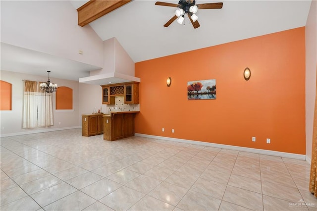 unfurnished living room with ceiling fan with notable chandelier, beam ceiling, and light tile patterned flooring