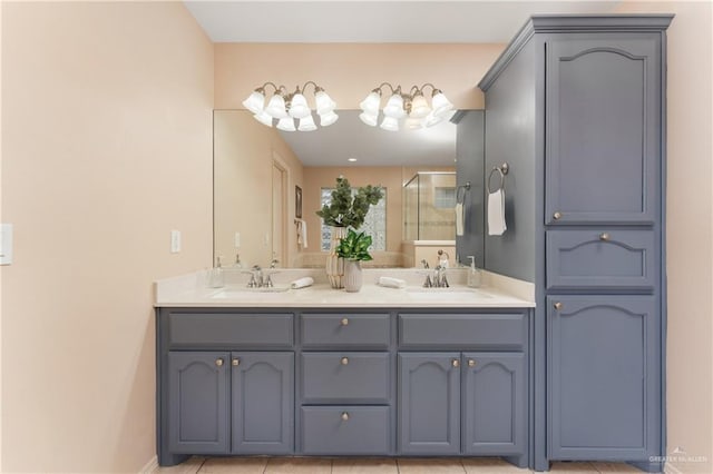 bathroom featuring vanity, tile patterned floors, and a shower with door