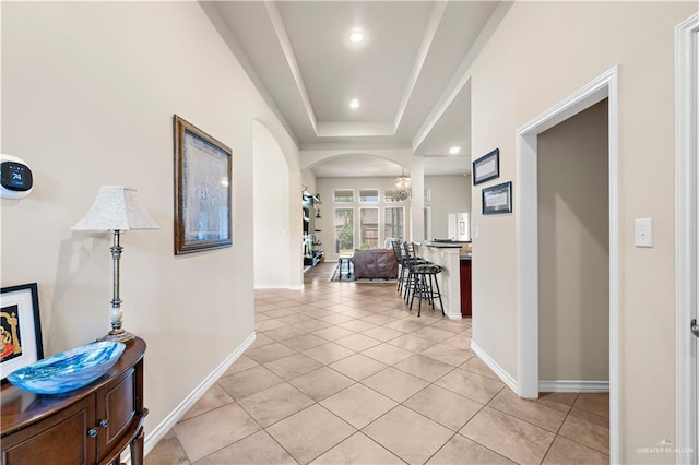 3606 Santa Lucia St, Mission, TX 78572 - hall with arched walkways, baseboards, light tile patterned floors, and recessed lighting