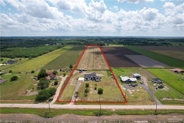 birds eye view of property featuring a rural view