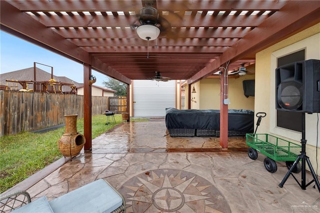 view of patio with ceiling fan and a pergola