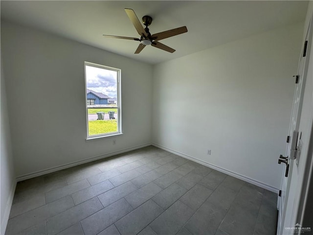 408 Janet Cir N, La Feria, TX 78559 - unfurnished room with a ceiling fan and dark tile patterned floors