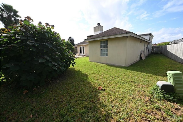 view of property exterior featuring a yard