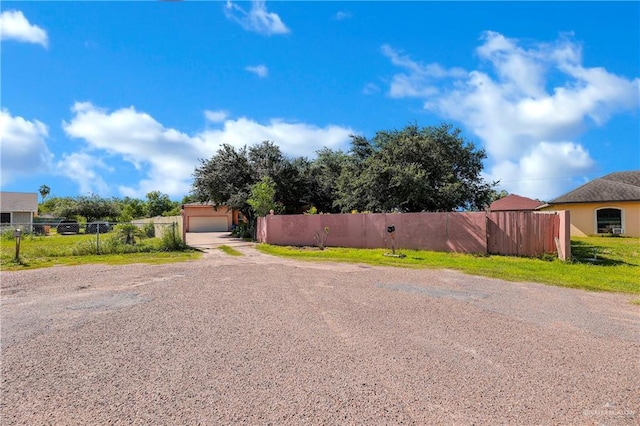 view of yard with a garage