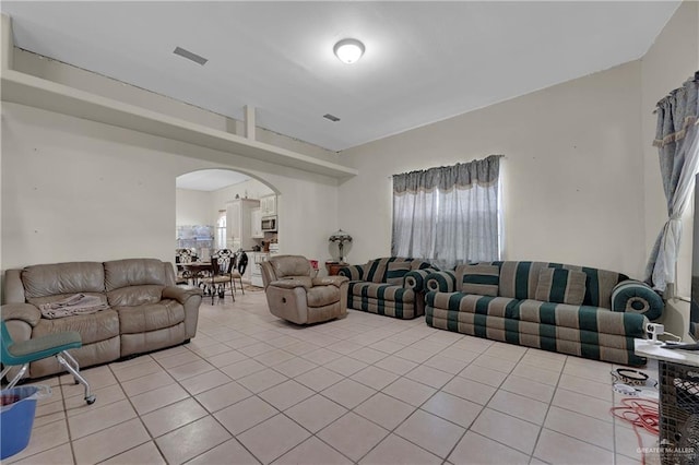 living room featuring light tile patterned floors