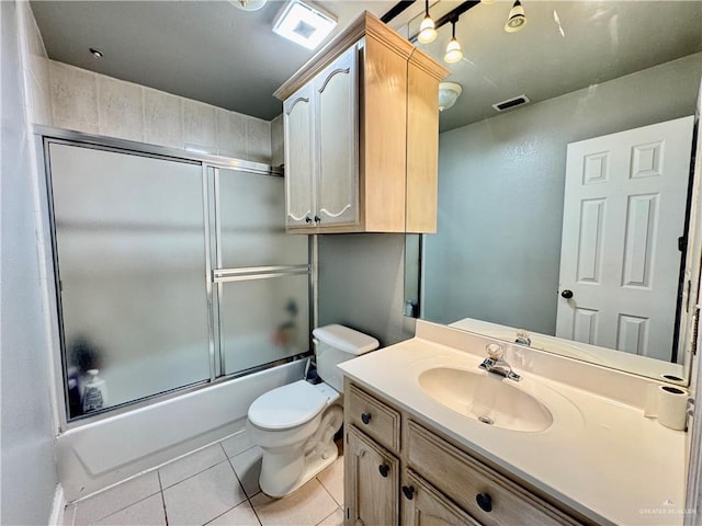 4208 Country St, Edinburg, TX 78541 - full bath with vanity, tile patterned floors, toilet, and combined bath / shower with glass door