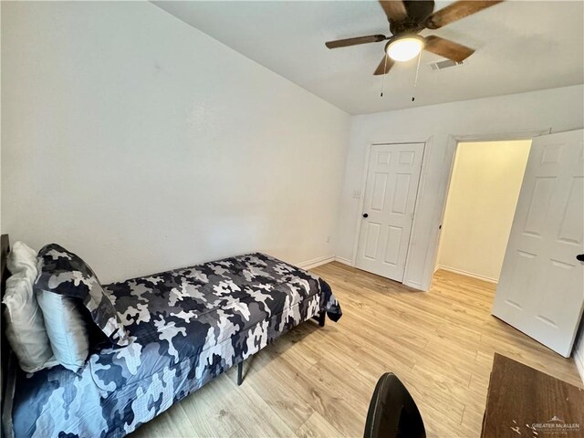 4208 Country St, Edinburg, TX 78541 - bedroom featuring light wood-style floors, baseboards, and a ceiling fan