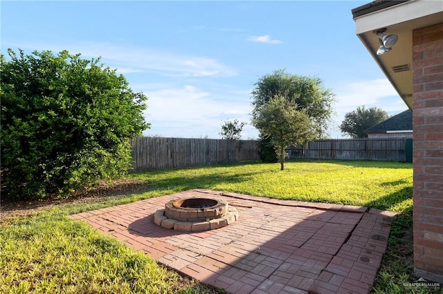 view of patio / terrace with a fire pit