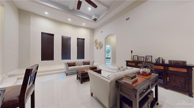 843 Brady Ave, Alamo, TX 78516 - living area featuring ceiling fan, arched walkways, a towering ceiling, beamed ceiling, and recessed lighting