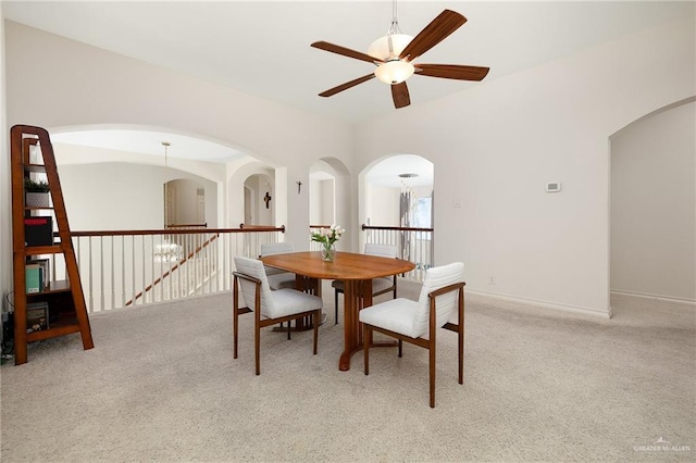 2800 San Ricardo St, Mission, TX 78572 - dining room with ceiling fan, carpet flooring, and arched walkways
