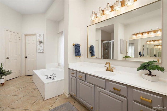 2800 San Ricardo St, Mission, TX 78572 - full bath featuring vanity, tile patterned floors, a bath, and a shower stall