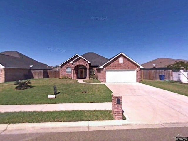 2500 W Xanthisma Ave, Mcallen, TX 78504 - ranch-style house with a garage, concrete driveway, and brick siding