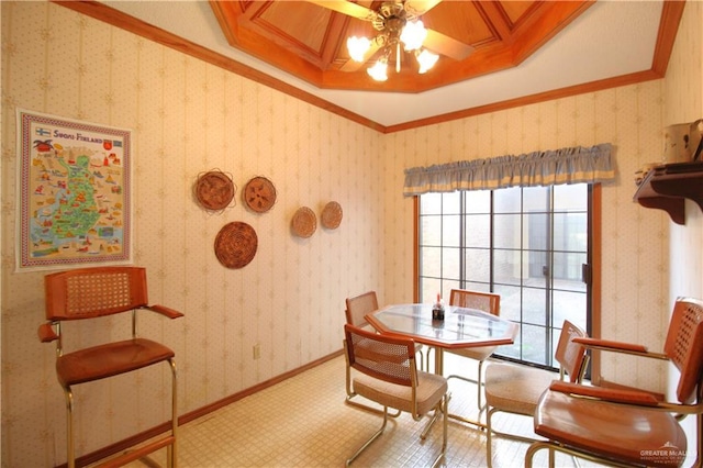 dining space with crown molding, plenty of natural light, and ceiling fan