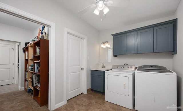 laundry area featuring ceiling fan, cabinets, separate washer and dryer, and sink