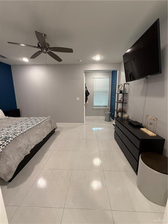 bedroom featuring recessed lighting, visible vents, a ceiling fan, light tile patterned flooring, and baseboards