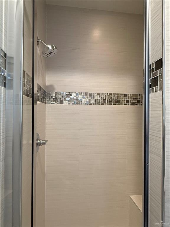 bathroom with a stall shower