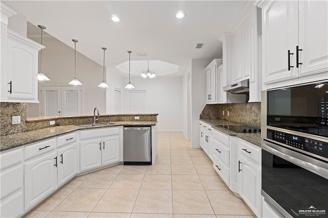 3213 Academy Ave, Edinburg, TX 78541 - kitchen featuring black appliances, decorative backsplash, white cabinets, a peninsula, and recessed lighting