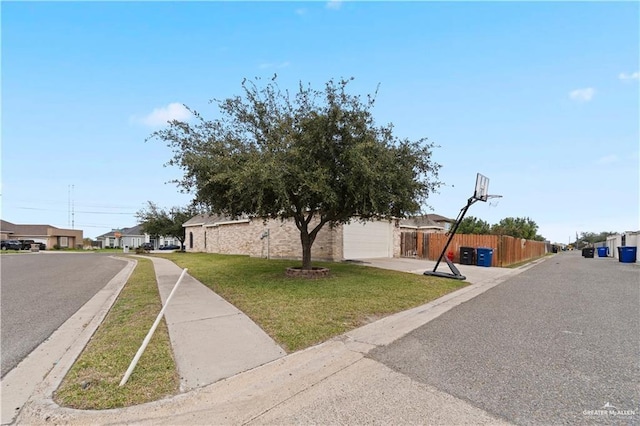 3213 Academy Ave, Edinburg, TX 78541 - view of asphalt street with curbs, a residential view, and sidewalks