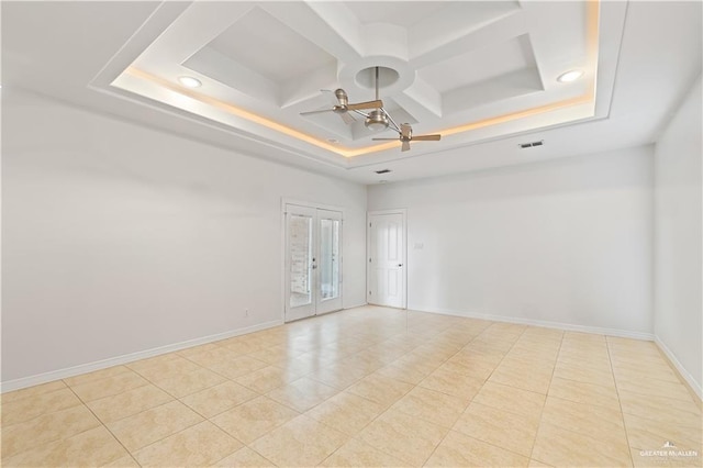 3213 Academy Ave, Edinburg, TX 78541 - empty room with coffered ceiling, a ceiling fan, light tile patterned flooring, a tray ceiling, and recessed lighting