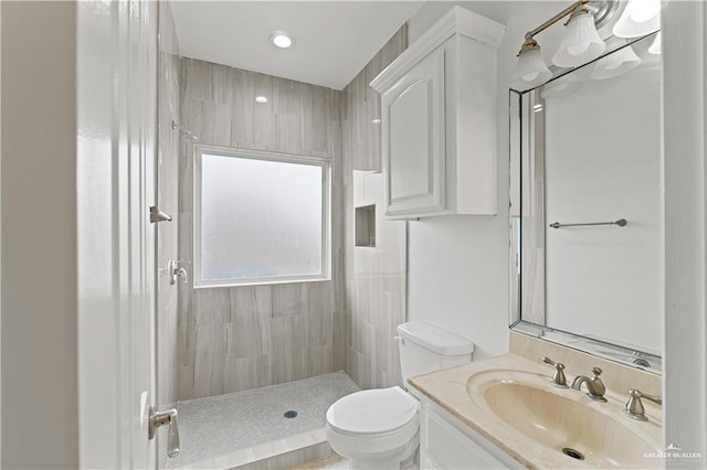 3213 Academy Ave, Edinburg, TX 78541 - bathroom with a tile shower and vanity