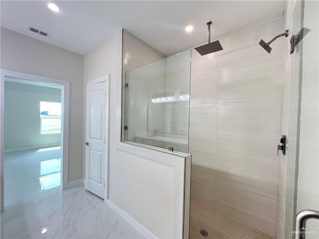 2309 S Cartier Dr, Edinburg, TX 78542 - bathroom featuring a walk in shower, recessed lighting, baseboards, and marble look tiles